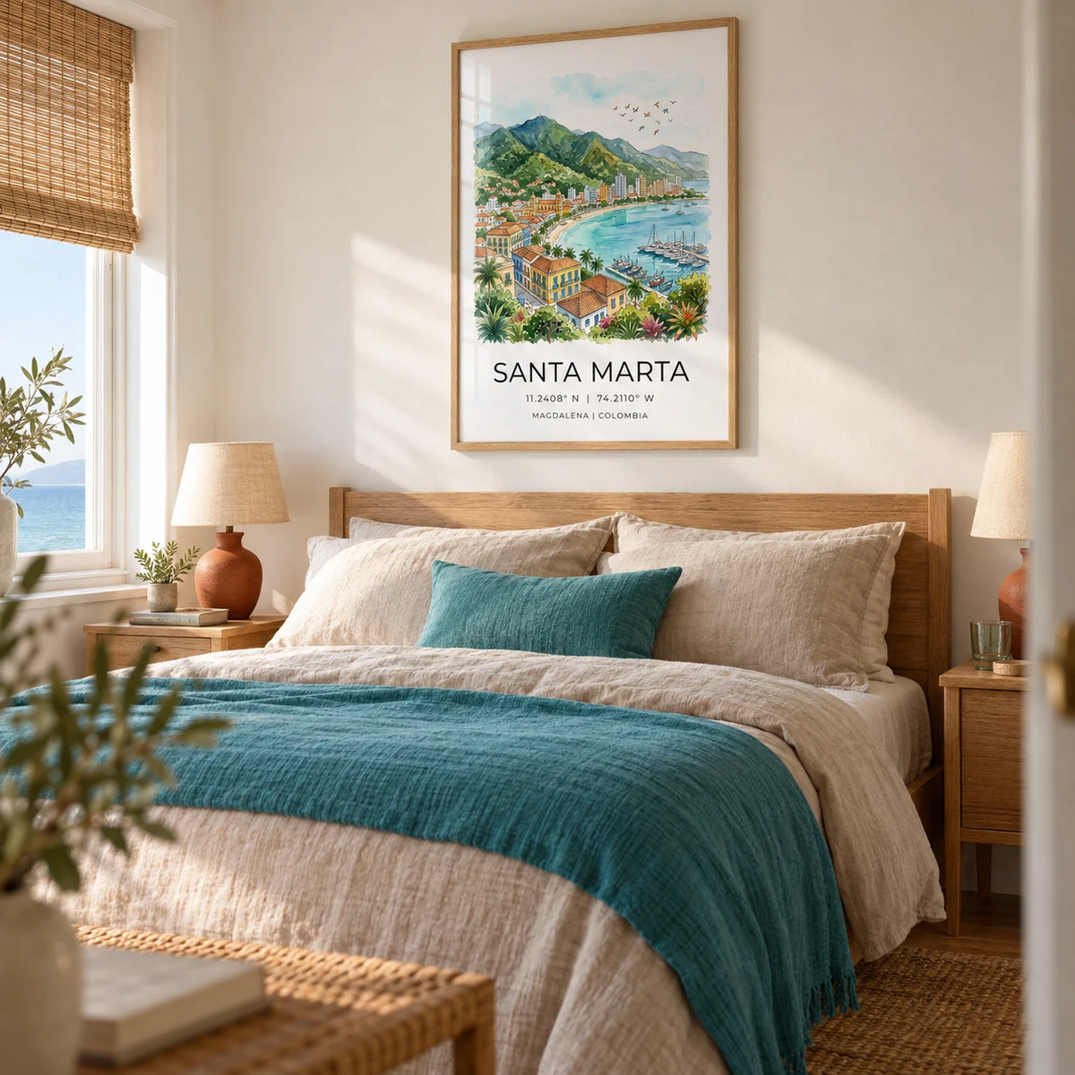 Santa Marta Art Print, framed on the wall of a peaceful main bedroom in a UK seaside home with warm white walls and natural woven blinds