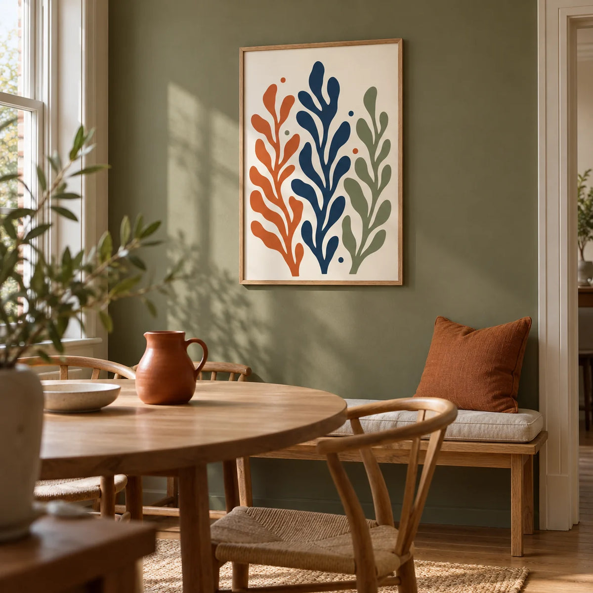 Seaweed Print, framed on the wall of a compact modern dining room in a UK terraced house with a muted olive green wall