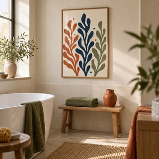 Seaweed Print, framed on the wall of a contemporary botanical bathroom in a UK home with cream plaster above plain cream tiles