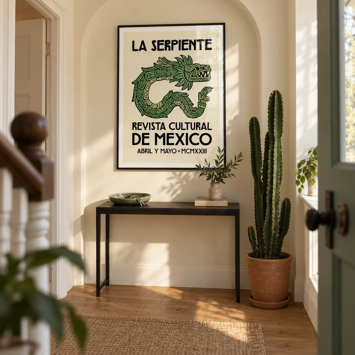 Serpent Cultural Art Print, framed on the wall of a welcoming hallway in a renovated UK terrace with a shallow arched niche and warm cream walls
