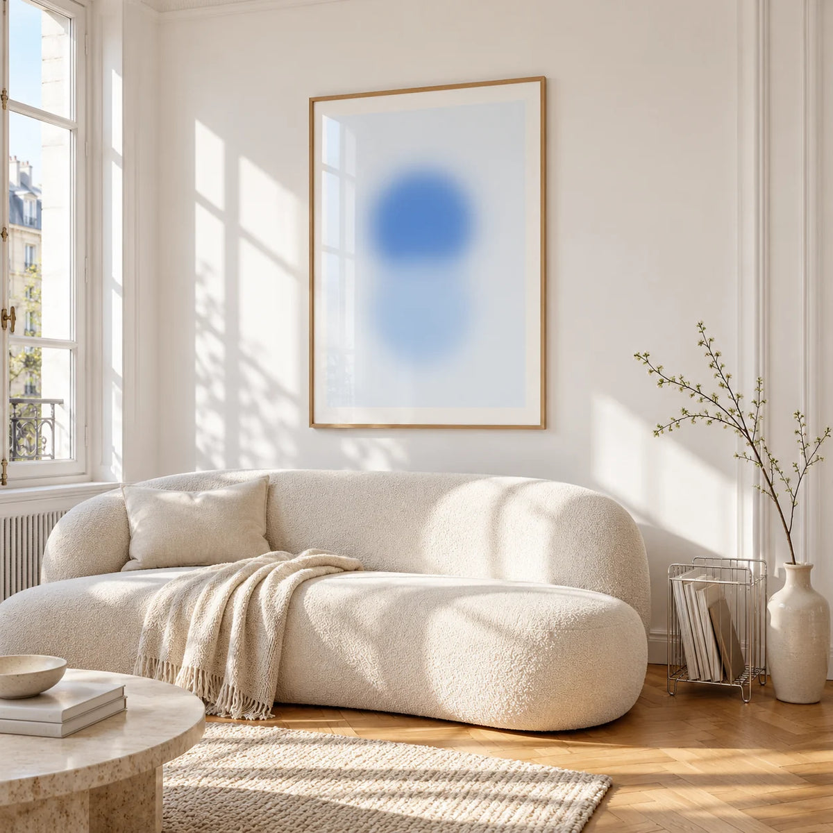 Sky Blue Print, framed on the wall of a bright living room corner