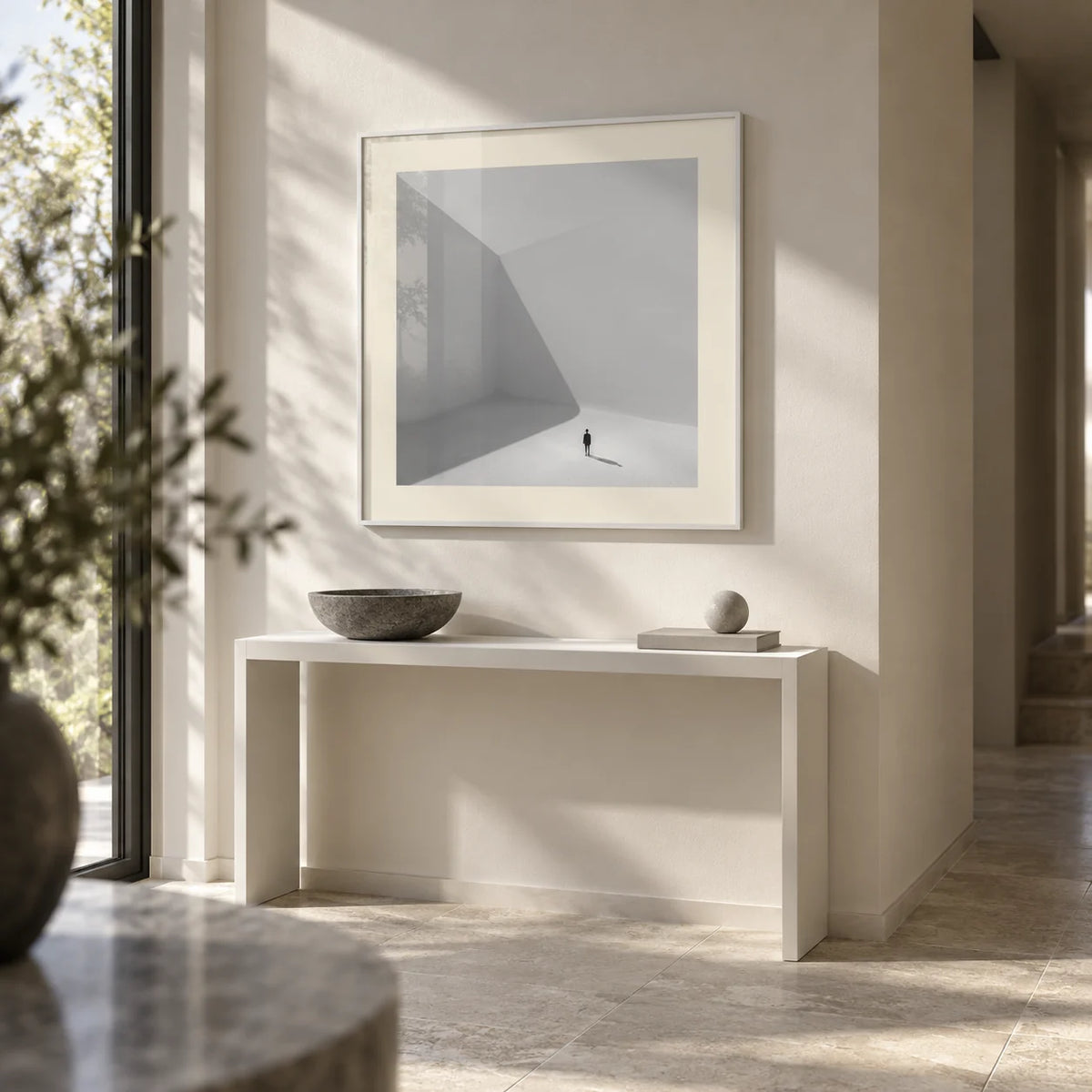 Square Art Prints, framed on the wall of a calm modern hallway
