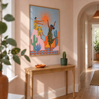 Sunset Women Art Print, framed on the wall of a bright narrow hallway in a renovated UK terrace with pale pink plaster walls and natural oak floorboards