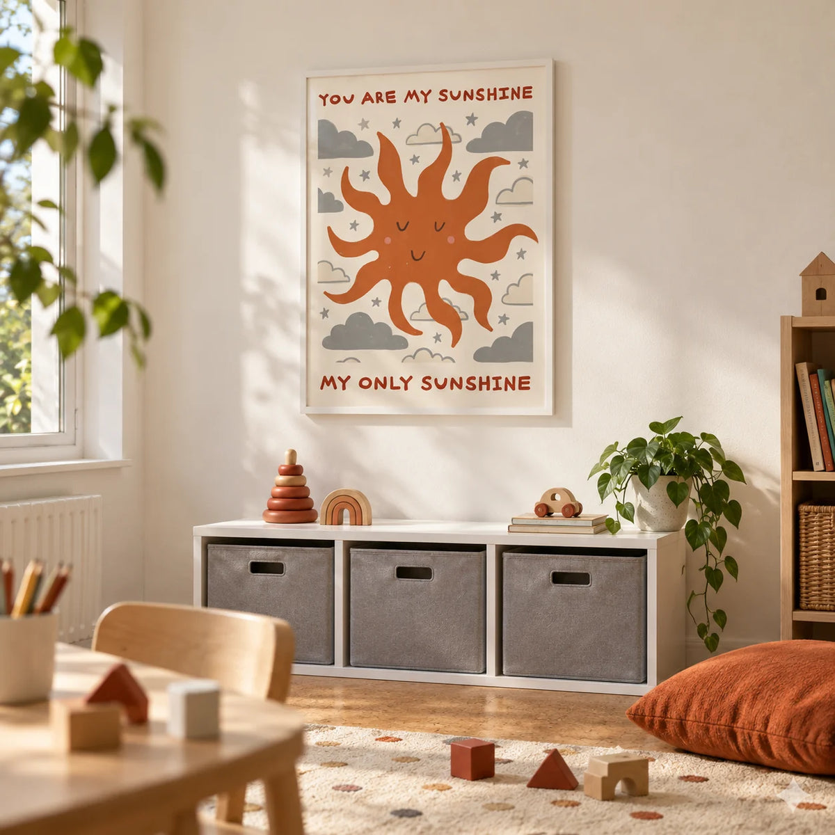 Sunshine Quote Wall Art, framed on the wall of a bright playroom in a modest UK family home with cream walls and a plain cork floor