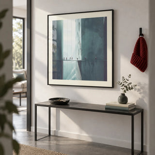 Surreal Art Prints, framed on the wall of a hallway in a modern flat with a white wall and a grey floor