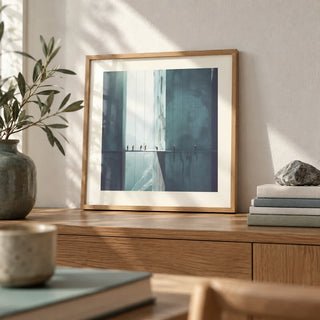 Surreal Art Prints, a small A4 framed print leaning on an oak shelf in a living room