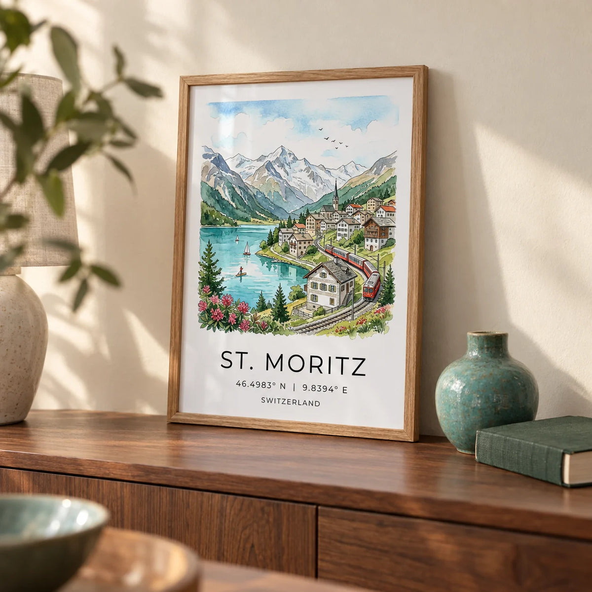 Swiss Landscape Art Print, a small A4 framed print leaning on a walnut sideboard in a living room