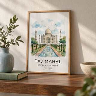 Taj Mahal Art Print, a small A4 framed print leaning on a walnut shelf in a living room