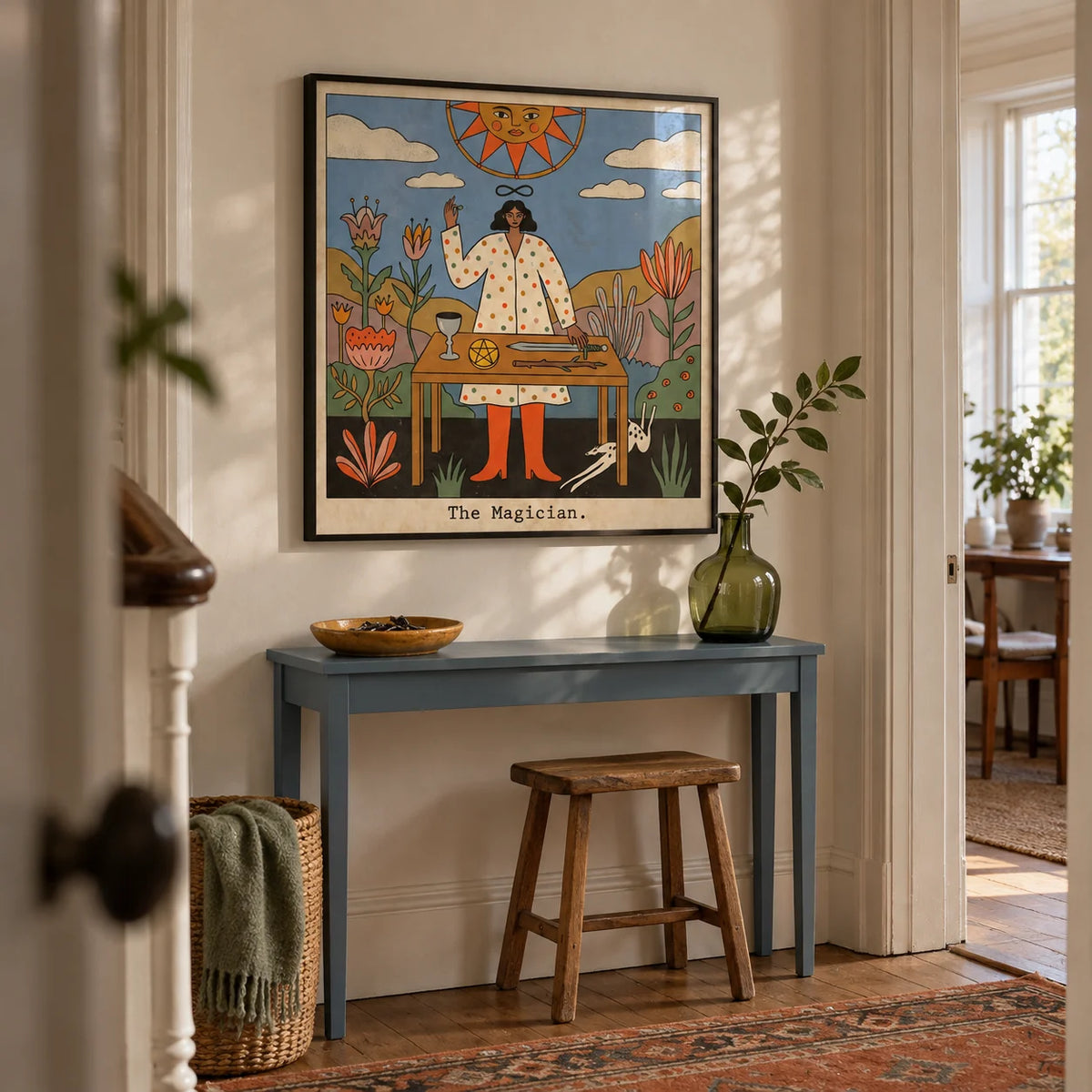 Tarot Magician Wall Art, framed on the wall of a welcoming narrow hallway in a UK period flat with warm white walls and a plain timber floor