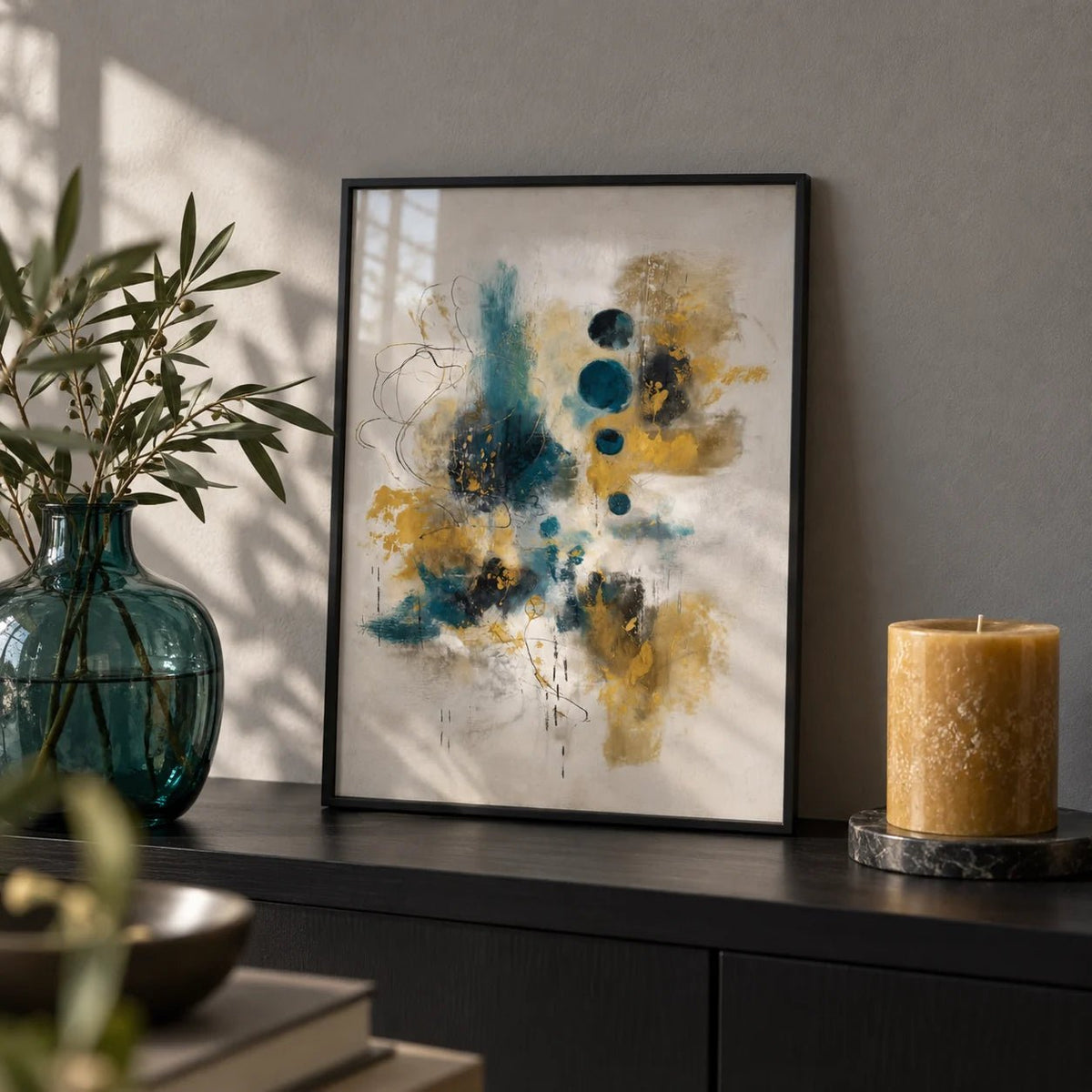 Teal And Black Art Print, a small A4 framed print leaning on a black shelf in a living room