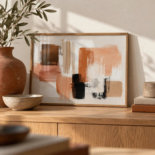 Terracotta and Cream Wall Art, a small A4 framed print leaning on an oak sideboard in a living room
