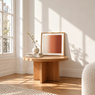 Terracotta Wall Art, a small square framed print leaning on a small solid oak side table