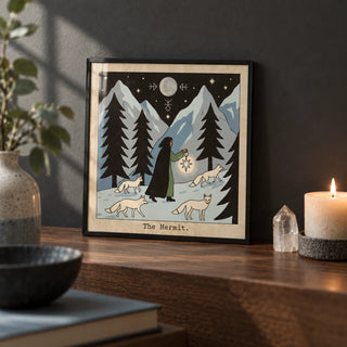The Hermit Tarot Card Art, a small A4 framed print leaning on a walnut shelf in a living room