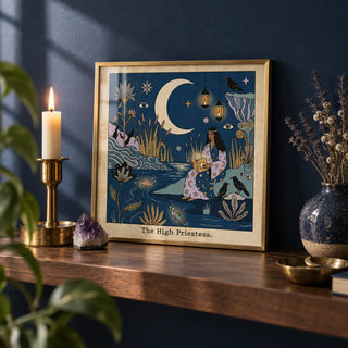 The High Priestess Tarot Card Art, a small A4 framed print leaning on a walnut shelf in a living room