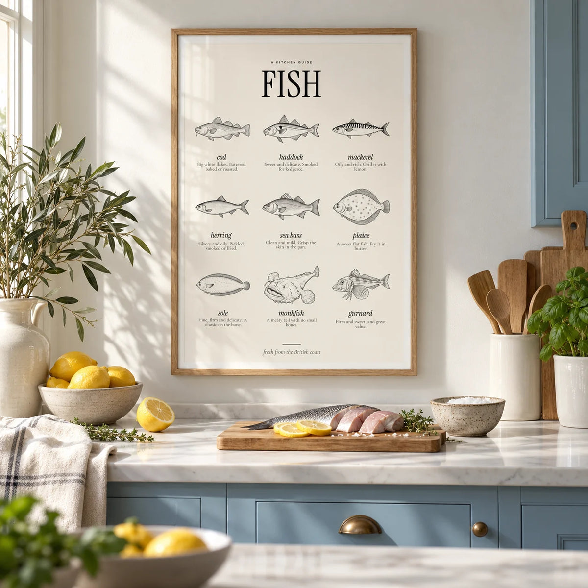 Types of Fish Print, framed on the wall of a bright coastal kitchen