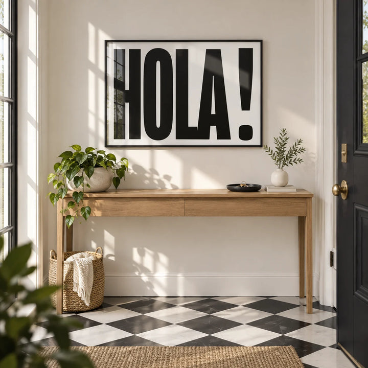 Typographic Posters, framed on the wall of a bright modern entrance hall by the front door