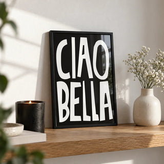 Typography Wall Art, a small A4 framed print leaning on an oak shelf in a living room