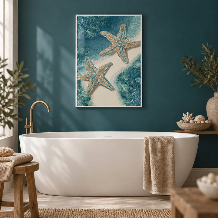 Underwater Starfish Print, framed on the wall of a calm bathroom with a plain deep teal painted wall and a white bath