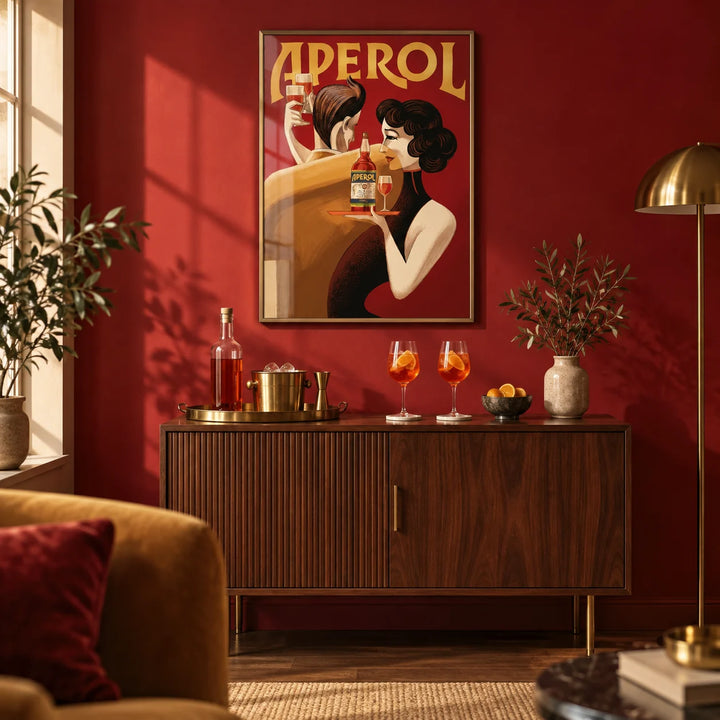 Vintage Drink Wall Art, framed on the wall of a warm home bar corner in a living room with a deep red painted wall and a dark wood floor