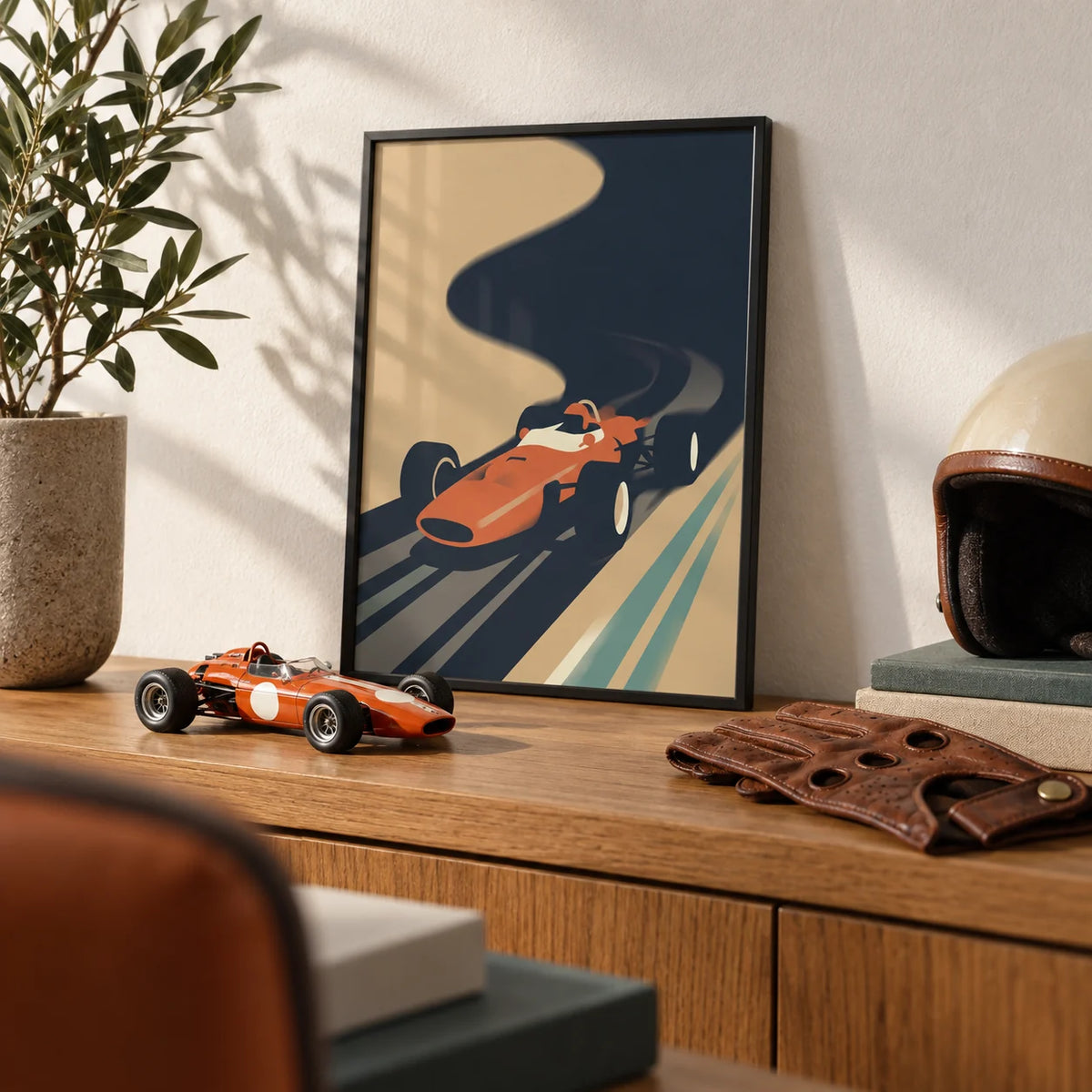 Vintage Grand Prix Poster, a small A4 framed print leaning on an oak shelf in a living room