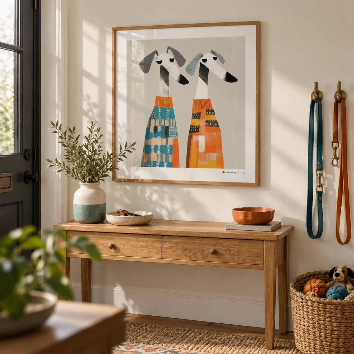 Wall Art Dog, framed on the wall of a hallway by the front door