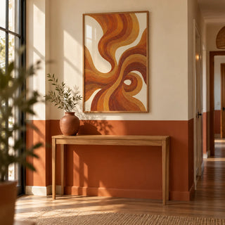 Wall Art with Burnt Orange, framed on the wall of a hallway with a burnt orange painted lower wall and cream above