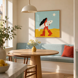 Woman Carrying Fish Print, framed on the wall of a sunny dining nook in a renovated UK terrace with cream walls and a plain pale oak floor